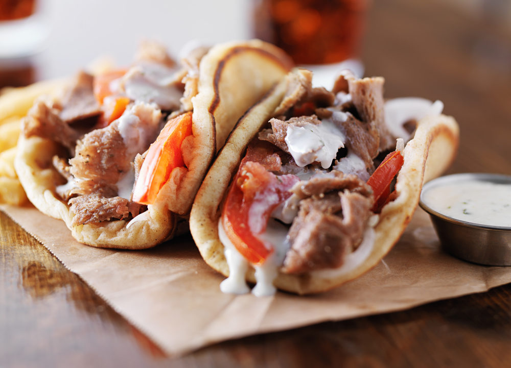 Greek gyros with tzatziki sauce – a must try | Photo by Athens Urban ADventures
