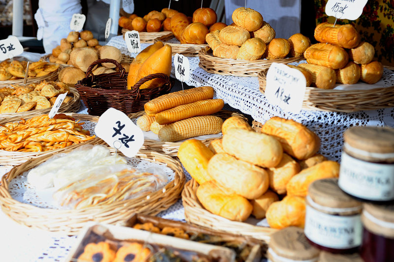 Snap some photos (and shop for snacks!) at the local market | Photo by Krakow Urban Adventures